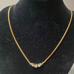 14kt yellow  gold and diamonds necklace.